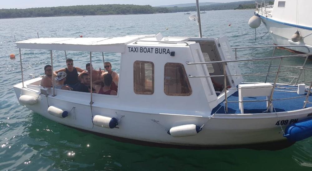 Half-day trip from Punat to hidden beaches by wooden boat